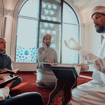 British Muslims Engaged in Quranic Discussion